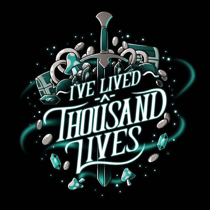 Premium Cotton T-shirt_TeeTurtle black I've Lived A Thousand Lives. Featuring text, 'I've Lived A Thousand Lives" surrounded by fantasy elements.