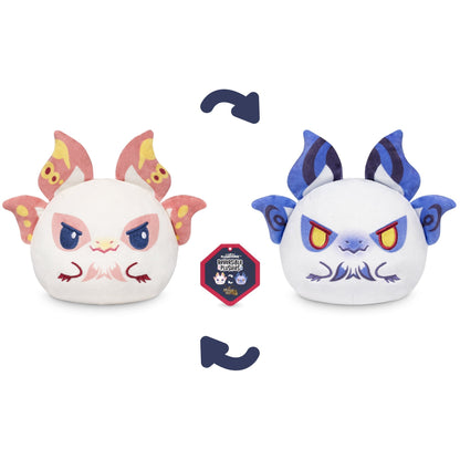 Two reversible Monster Hunter Plushiverse Mizutsune 4" Reversible Plushies featuring an angry white creature with pink and orange accents on one side, and an angry blue creature with purple and dark blue accents on the other side. Enjoy the fun versatility of these stuffed toys!