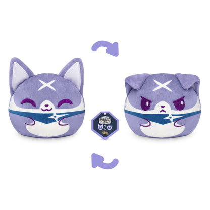 Two-sided reversible plushie in the shape of a round cat. One side depicts a happy purple cat; the other, an angry purple cat. A logo in the middle reads "TeeTurtle Plushiverse Palamute 4" Reversible Plushie." This stuffed toy is perfect for fans of quirky plushies!