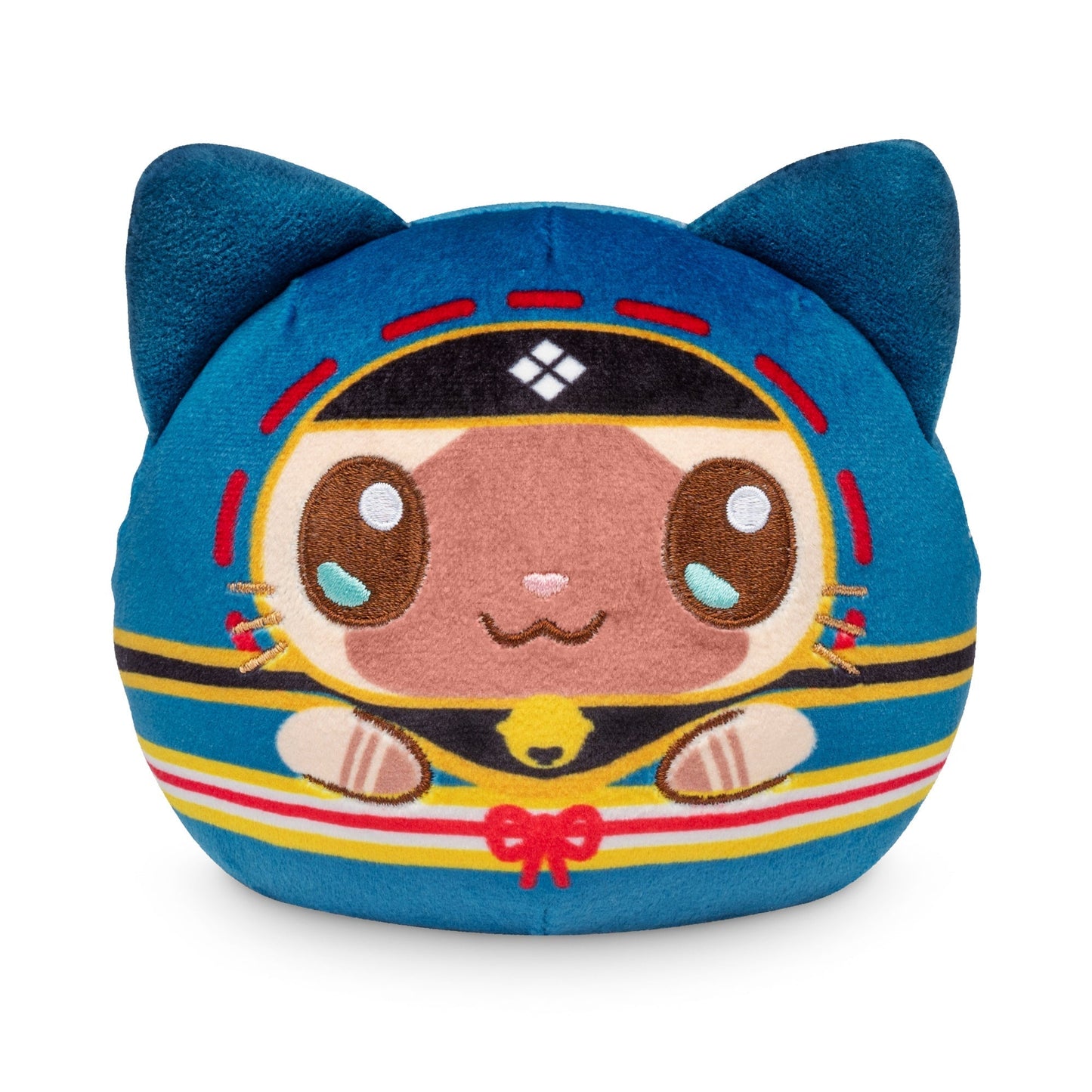 A Plushiverse Palico 4" Reversible Plushie in the shape of a cat with large eyes, blue ears, and a colorful, detailed design, including red, yellow, and black patterns on its body. This adorable stuffed toy comes from the Monster Hunter collection.