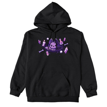 Pullover Hoodie_TeeTurtle Bat & Baubles black t-shirt featuring a bat surrounded by glowing candles, bones, potion bottles, skulls, and crystals.