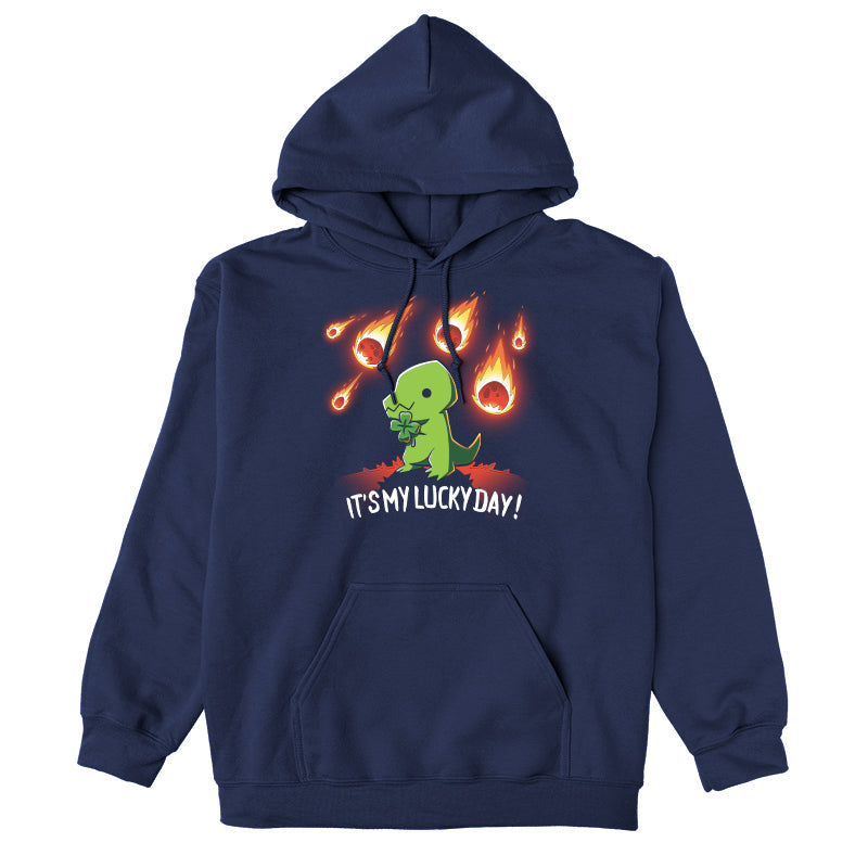 Pullover Hoodie_TeeTurtle It's My Lucky Day navy blue design featuring a dinosaur holding a four-leaf clover while meteors fall from the sky. The text below reads, "It's my lucky day!"