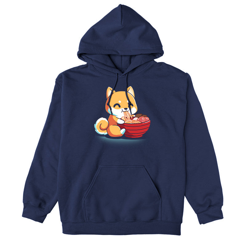 Pullover Hoodie_The Ramen Shiba design from monsterdigital features a cute cartoon Shiba Inu dog happily eating a large bowl of ramen noodles with various toppings, all printed on a super soft ringspun cotton navy blue apparel. The dark background adds an extra charm to this cozy and stylish tee.