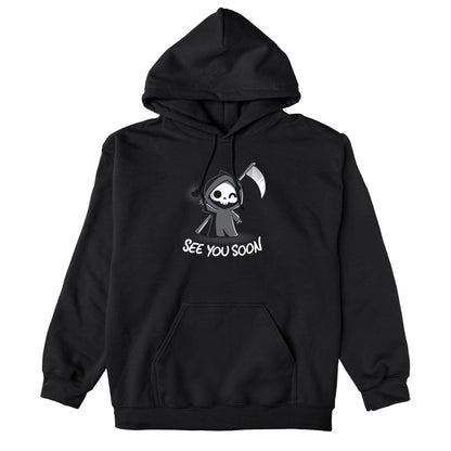 Pullover Hoodie_TeeTurtle See You Soon black design featuring a spooky cartoon Grim Reaper holding a scythe, waving, and a floating black heart next to it, with the text below that says in dark humor "SEE YOU SOON". 