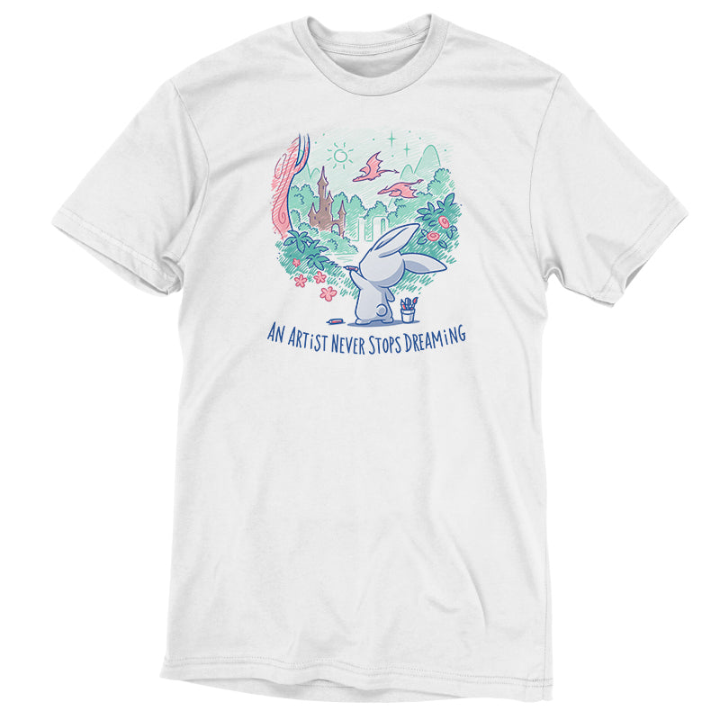 Premium Cotton T-shirt_TeeTurtle An Artist Never Stops Dreaming white t-shirt featuring a bunny painting a whimsical landscape with a castle, trees, and flying creature.