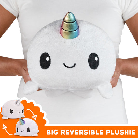 Get your hands on the popular Big Reversible Narwhal Plushie from TeeTurtle. This big and adorable mood plushie is perfect for cuddling and will bring double the fun with its reversible design.