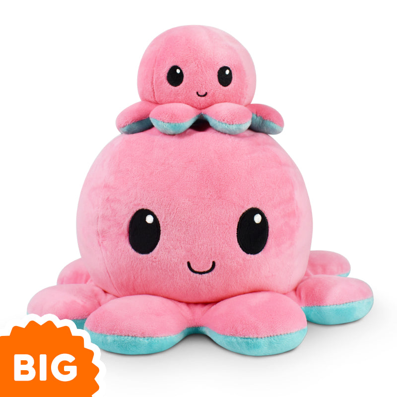 An original TeeTurtle Big Reversible Octopus Plushie (Aqua + Pink) is stacked on top of another octopus.