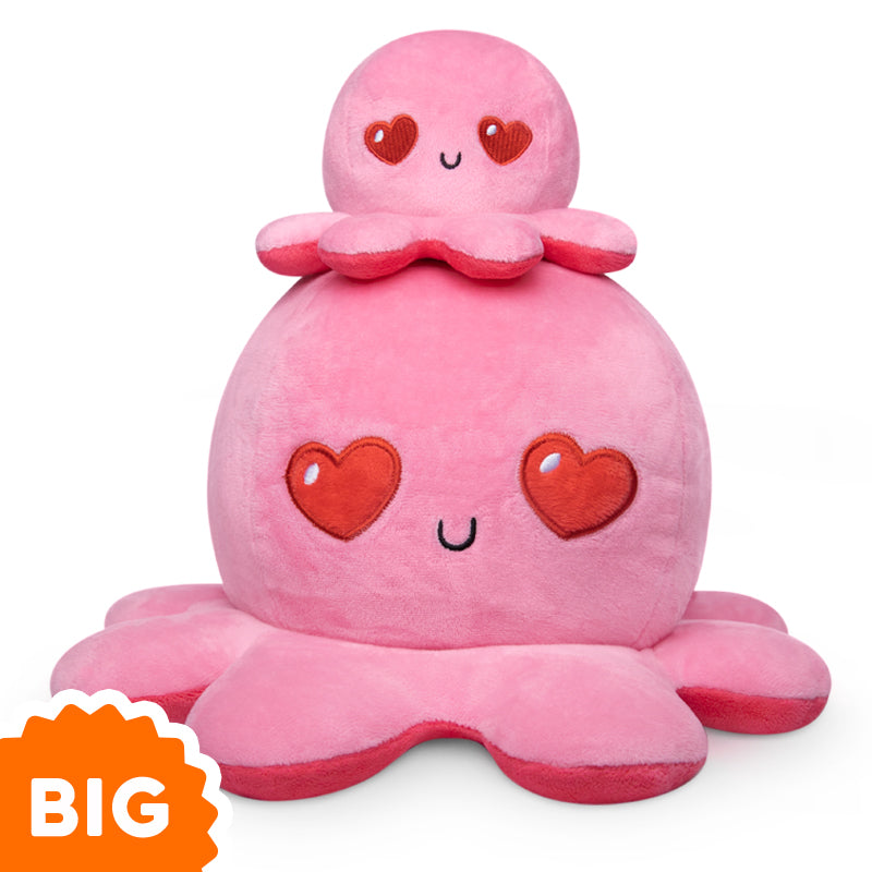 A TeeTurtle Big Reversible Octopus Plushie with hearts on it.