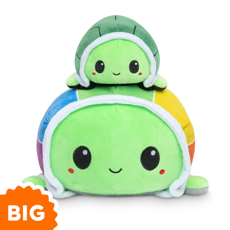 Two Big Reversible Turtle Plushies by TeeTurtle sitting on top of each other.