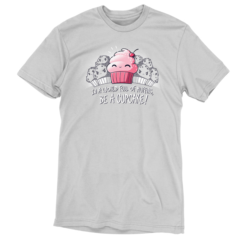 Premium Cotton T-shirt_TeeTurtle Be a Cupcake silver gray t-shirt featuring a cheerful pink cartoon cupcake with a cherry on top smiling among angry muffins, captioned "In a world full of muffins, be a cupcake!" in this food design.