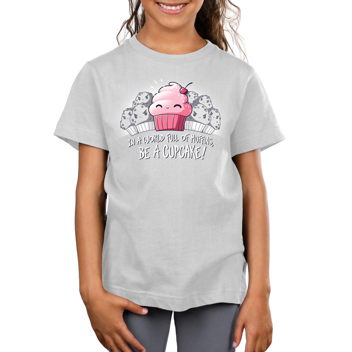 Premium Cotton T-shirt_TeeTurtle Be a Cupcake silver gray t-shirt featuring a cheerful pink cartoon cupcake with a cherry on top smiling among angry muffins, captioned "In a world full of muffins, be a cupcake!" in this food design.