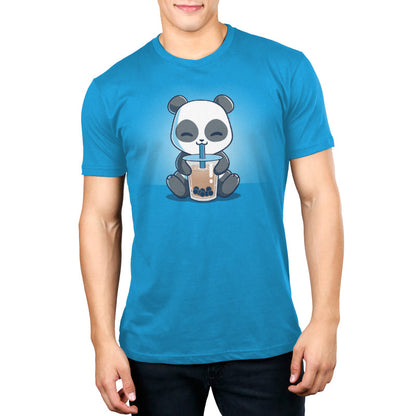 Premium Cotton T-shirt_TeeTurtle Boba Panda cobalt blue t-shirt featuring a panda sitting and happily drinking bubble tea with a straw from a large cup.