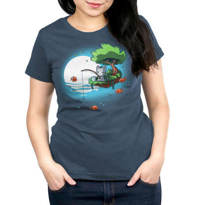 Premium Cotton T-shirt_TeeTurtle Cat Fishing denim blue t-shirt featuring a cat sitting tree branch over water, fishing with a rod. 