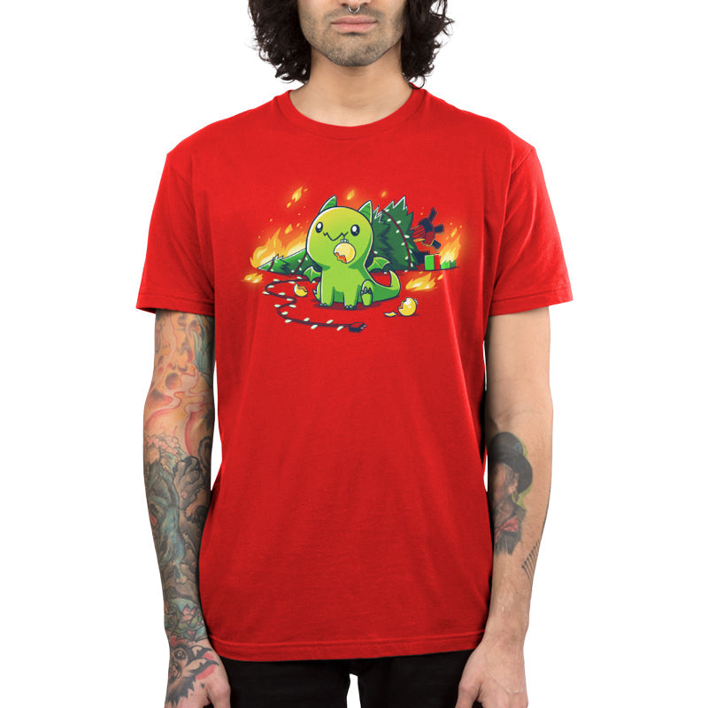 Premium Cotton T-shirt_TeeTurtle Christmas Dragon red t-shirt featuring a cute green dragon with a broken ornament hanging from its mouth and a Christmas tree on fire behind it.