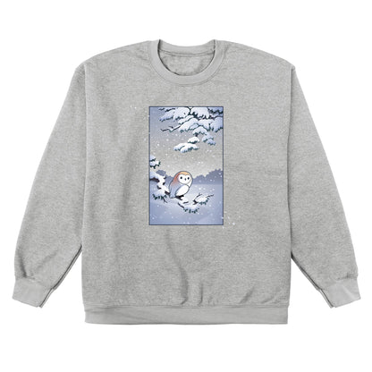 Crew Neck Sweatshirt_TeeTurtle heather gray Snowy Owl apparel featuring a barn owl perched on a snowy branch with snow falling in the background.