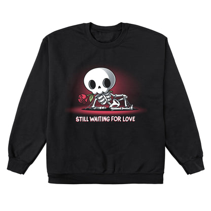 Crew Neck Sweatshirt_TeeTurtle Still Waiting For Love black design featuring a skeleton holding a red rose and lying on the ground with the text "Still Waiting for Love."