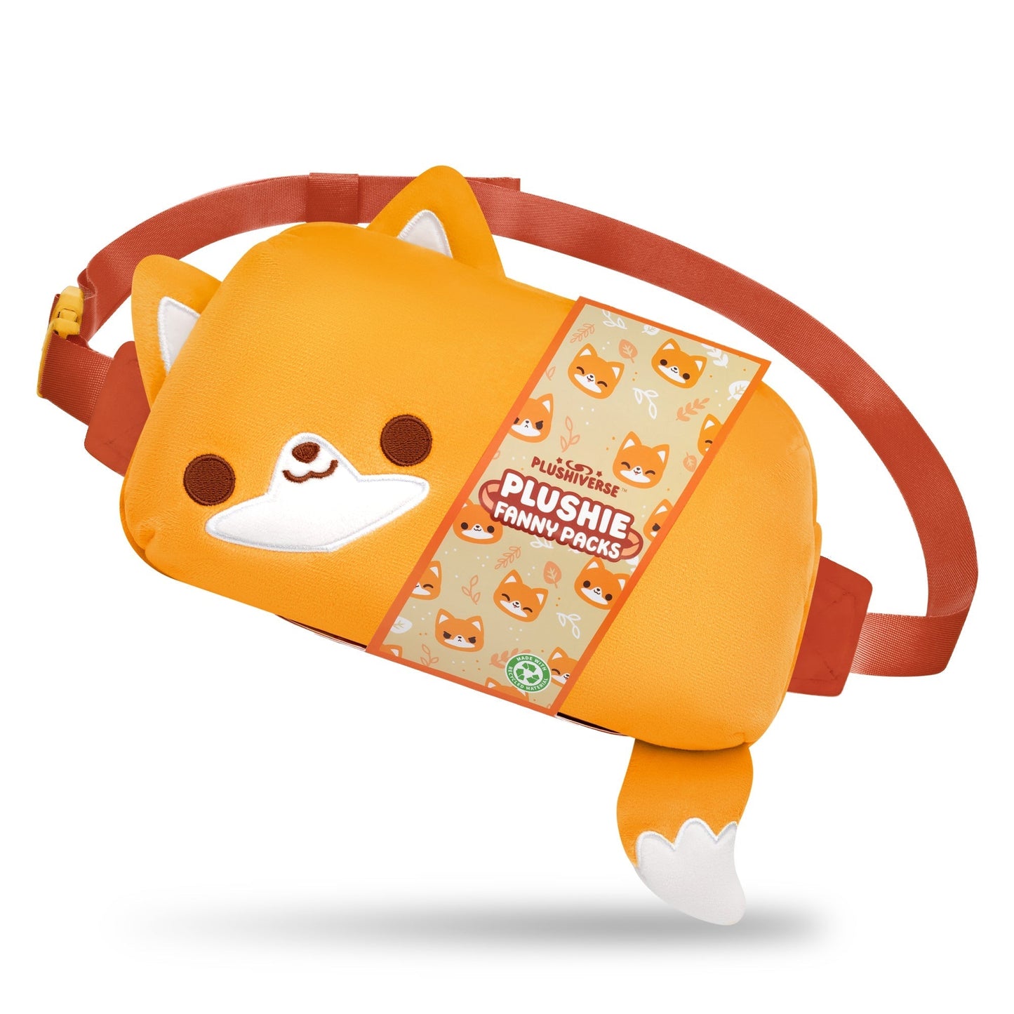 Orange fanny pack featuring a fox design with ears and a tail. Part of the Kawaii Cuties collection, it boasts a smiling face, white accents, and an orange adjustable belt. This TeeTurtle Plushiverse Feeling Foxy Plushie Fanny Pack offers hands-free functionality with style. Packaging displays "Plushie Fanny Packs.