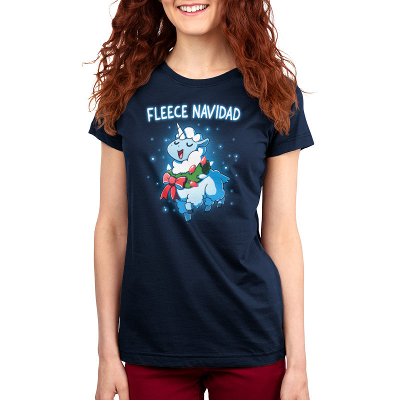 Premium Cotton T-shirt_TeeTurtle Fleece Navidad navy t-shirt featuring a sheep decorated with Christmas lights and a wreath, with the text "Fleece Navidad" above it.