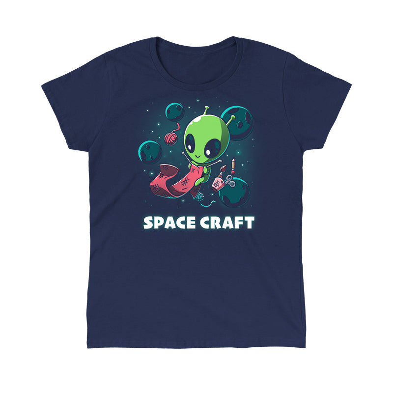 Classic Cotton T-shirt_TeeTurtle Space Craft navy blue t-shirt featuring an illustration of a green alien knitting a red scarf in space surrounded by planets, stars, balls of yarn, and a cup holding scissors, a paint brush and floating pencil. The words "SPACE CRAFT" are written below.