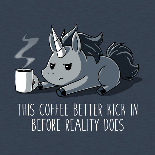 Premium Cotton T-shirt_Teeturtle Before Reality Kicks In denim t-shirt featuring a grumpy-looking unicorn on its stomach with a cup of steaming coffee in front of it.