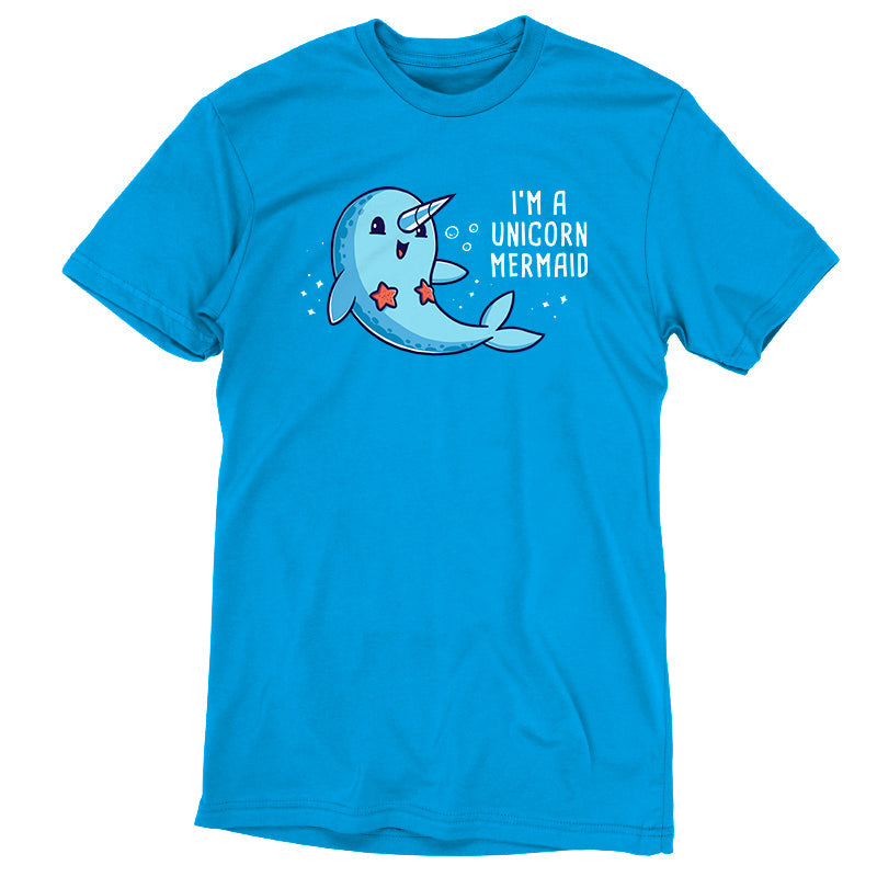 Teeturtle Cobalt Blue I'm a Unicorn Mermaid Premium Cotton T-shirt. Featuring a cute, smiling Narwhal wearing a pair of starfish on its chest while swimming in the ocean with sparkles and bubbles