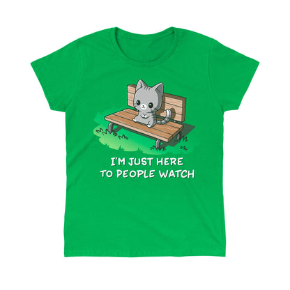 Classic Cotton T-shirt_TeeTurtle I'm Just Here to People Watch Irish green t-shirt featuring an illustration of a cute gray cartoon cat sitting on a bench in the grass, accompanied by the text "I'M JUST HERE TO PEOPLE WATCH" written below. 