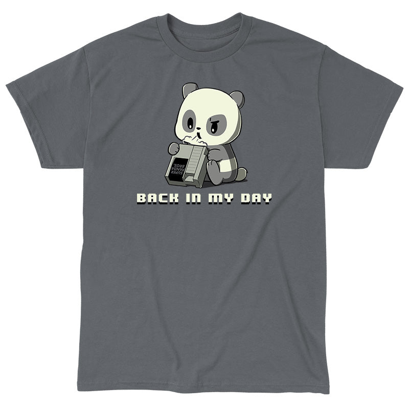 Classic Cotton T-shirt_A cartoon panda blows into an old video game cartridge labeled "Super Panda Bros." on a charcoal gray apparel. The text below reads "Back in my day." This monsterdigital "Back in My Day" original is perfect for the nostalgic video game technician.