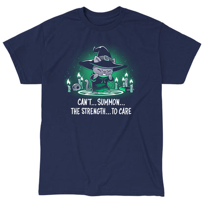 Classic Cotton T-shirt_TeeTurtle Can't Summon The Strength To Care Navy Blue t-shirt featuring a grey cat in a black witch's hat and black robe struggling to cast a spell. It's standing in a summoning circle with candles, a scull, and a book around it. It is surrounded by a green glow. Text underneath it says "Can't... summon... the strength... to care"