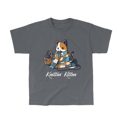 Classic Cotton T-shirt_TeeTurtle Knittin' Kitten charcoal gray t-shirt featuring a calico cat knitting a long scarf that’s wrapped around it with a basket of yarn next to it.