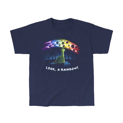 Classic Cotton T-shirt_TeeTurtle Look, a Rainbow! navy blue t-shirt featuring a green dinosaur looking up at rainbow asteroids in the starry night sky. The background is filled with black palm trees in the distance being illuminated from the asteroids, with "LOOK, A RAINBOW!" written underneath the illustration.