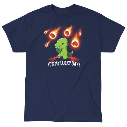 Classic Cotton T-shirt_TeeTurtle It's My Lucky Day navy blue t-shirt featuring a dinosaur holding a four-leaf clover while meteors fall from the sky. The text below reads, "It's my lucky day!"