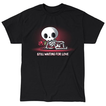 Classic Cotton T-shirt_TeeTurtle Still Waiting For Love black t-shirt featuring a skeleton holding a red rose and lying on the ground with the text "Still Waiting for Love."