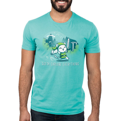 Premium Cotton T-shirt_TeeTurtle Gotta Explore Everything Caribbean Blue t-shirt featuring an excited magical cat holding a map and sword running through the mountains.