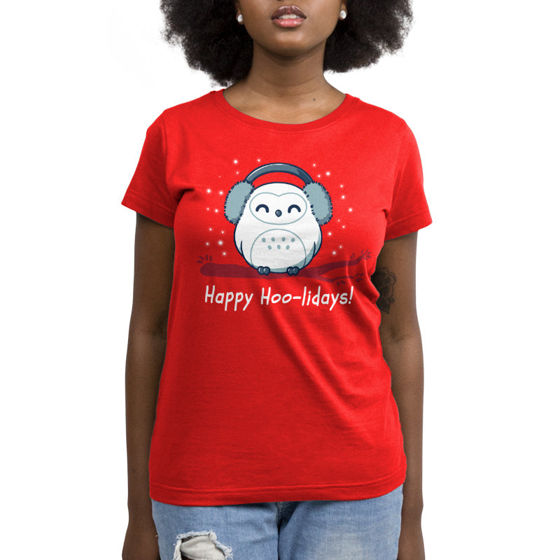 Premium Cotton T-shirt_TeeTurtle Happy Hoo-lidays red t-shirt featuring a cheerful snowy owl wearing earmuffs and sitting on a branch surrounded by falling snow.