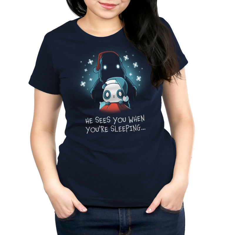 Premium Cotton T-shirt_TeeTurtle He Sees You When You're Sleeping navy blue t-shirt featuring a dark figure wearing a Santa hat with glowing eyes standing behind a worried-looking panda in bed also wearing a Santa hat. The shirt reads "He Sees You When You're Sleeping...".