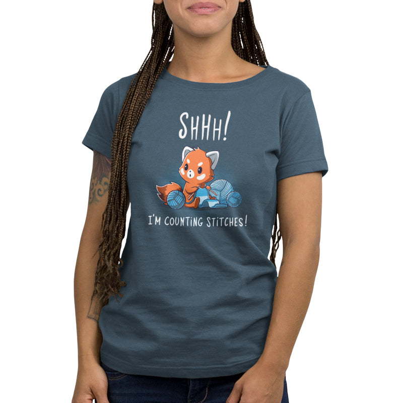 Premium Cotton T-shirt_Teeturtle Shhh! I'm Counting Stitches! denim t-shirt featuring a red panda is knitting with blue yarn. Text above reads, "Shhh! I'm Counting Stitches!" 