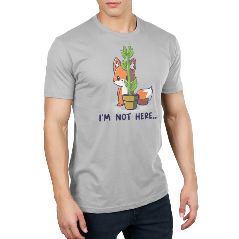 Premium Cotton T-shirt_Teeturtle I'm Not Here... Silver gray t-shirt featuring an anxious fox awkwardly trying to hide behind a thin potted plant with the words 'I'm Not Here...' below.