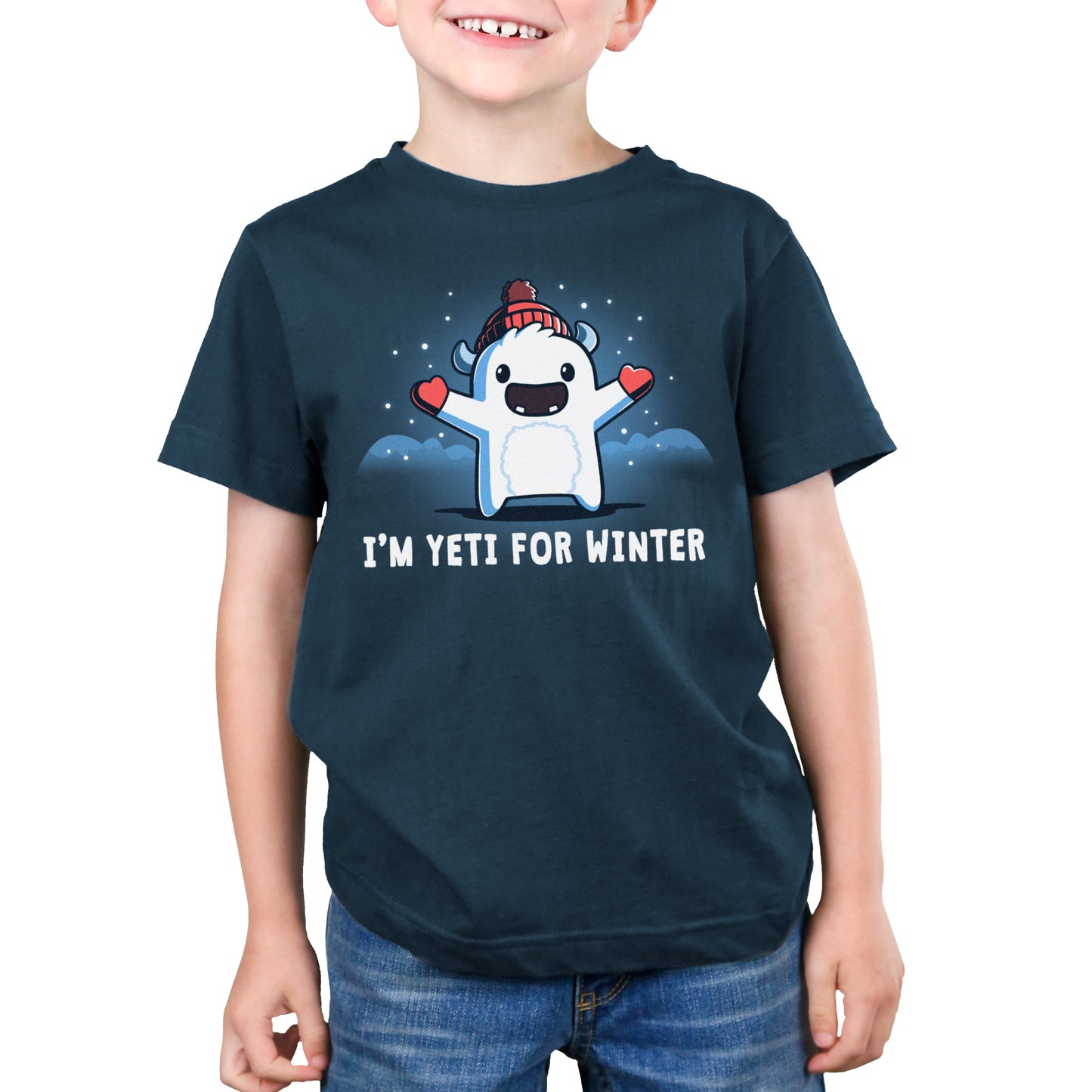 Premium Cotton T-shirt_Teeturtle I'm Yeti for Winter denim t-shirt featuring a happy Yeti in the snowy winter mountains wearing a pom-pom winter hat and mittens.