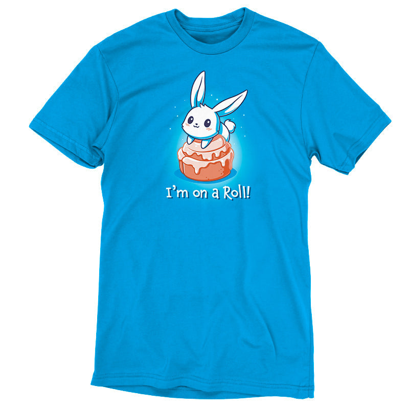 Premium Cotton T-shirt_TeeTurtle I'm On A Cinnamon Roll Cobalt Blue t-shirt featuring a cute cartoon bunny sitting on top of a glazed cinnamon roll with the text "I'm On a Roll!" written below.