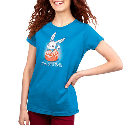 Premium Cotton T-shirt_TeeTurtle I'm On A Cinnamon Roll Cobalt Blue t-shirt featuring a cute cartoon bunny sitting on top of a glazed cinnamon roll with the text "I'm On a Roll!" written below.