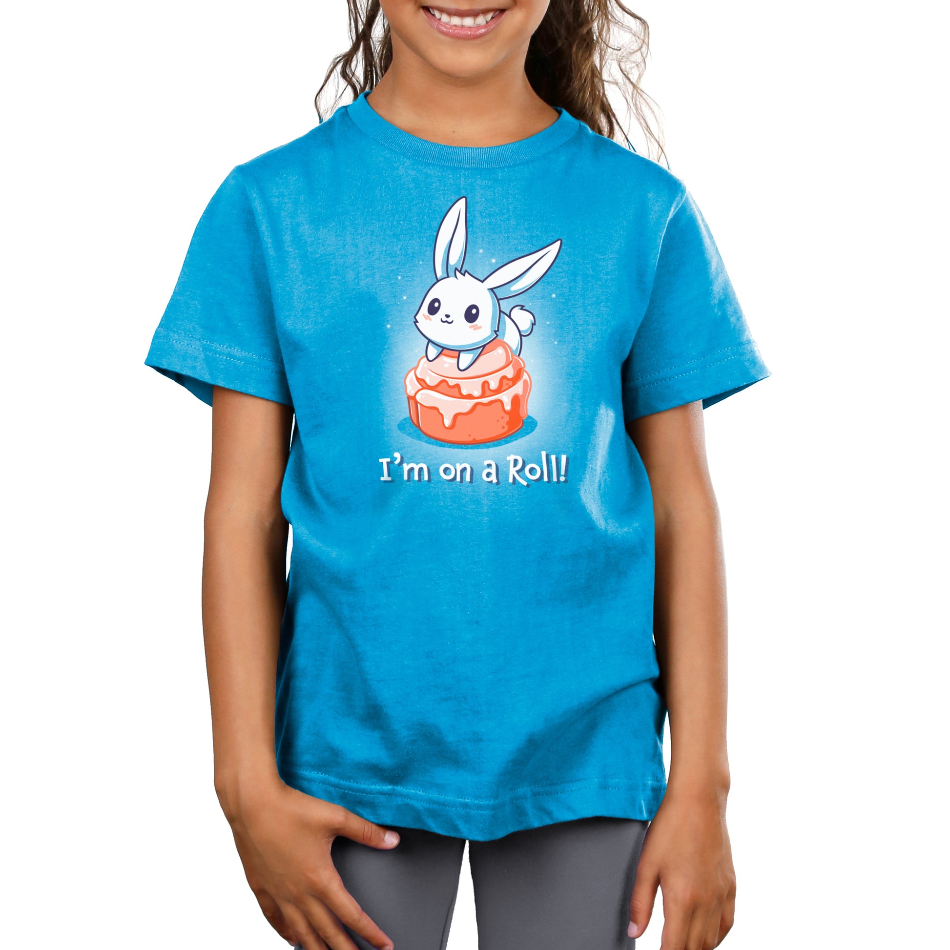 Premium Cotton T-shirt_TeeTurtle I'm On A Cinnamon Roll Cobalt Blue t-shirt featuring a cute cartoon bunny sitting on top of a glazed cinnamon roll with the text "I'm On a Roll!" written below.