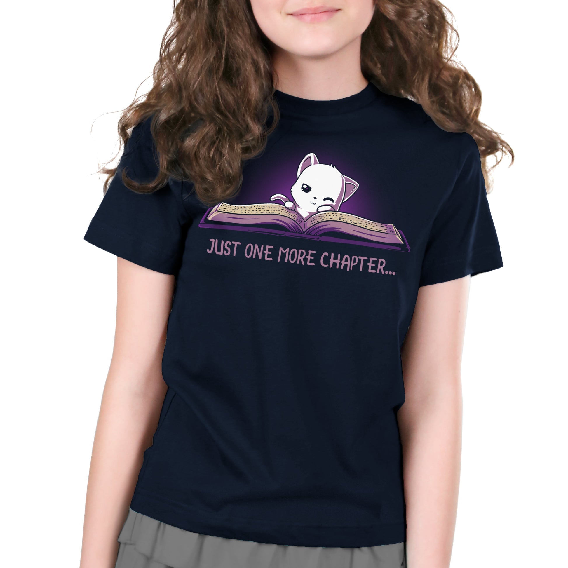 Premium Cotton T-shirt_TeeTurtle navy blue Just One More Chapter. Featuring a sleepy white cat reading a book.