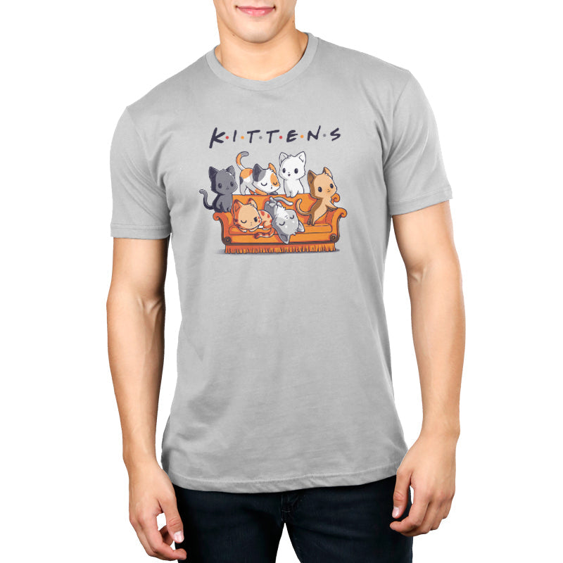 Premium Cotton T-shirt_TeeTurtle Kittens silver gray t-shirt featuring six kittens in various colors and patterns sitting and lying on an orange couch with the word "Kittens" spelled out above them.