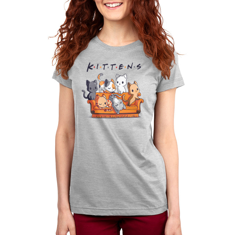 Premium Cotton T-shirt_TeeTurtle Kittens silver gray t-shirt featuring six kittens in various colors and patterns sitting and lying on an orange couch with the word "Kittens" spelled out above them.