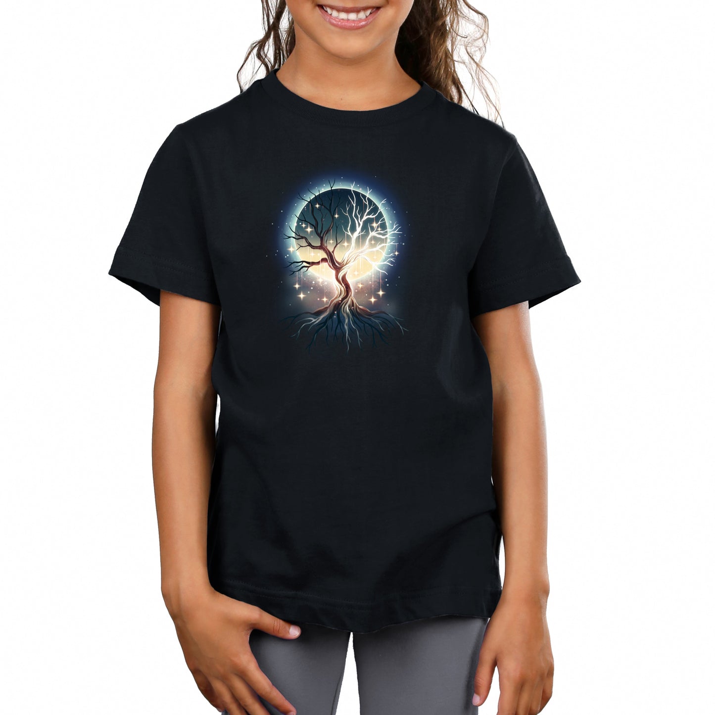 Premium Cotton T-shirt_TeeTurtle black Celestial Tree t-shirt featuring a floating tree with roots exposed with stars hanging from its branches and a full moon that can be seen in the background through the tree’s branches.