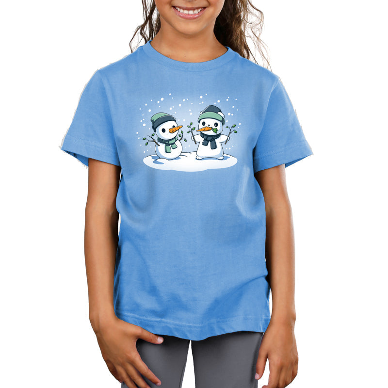 Premium Cotton T-shirt - featuring a polar bear in a green hat and scarf holding up two branches in its hands with a carrot in its mouth standing in front of a snowman doing the exact same thing