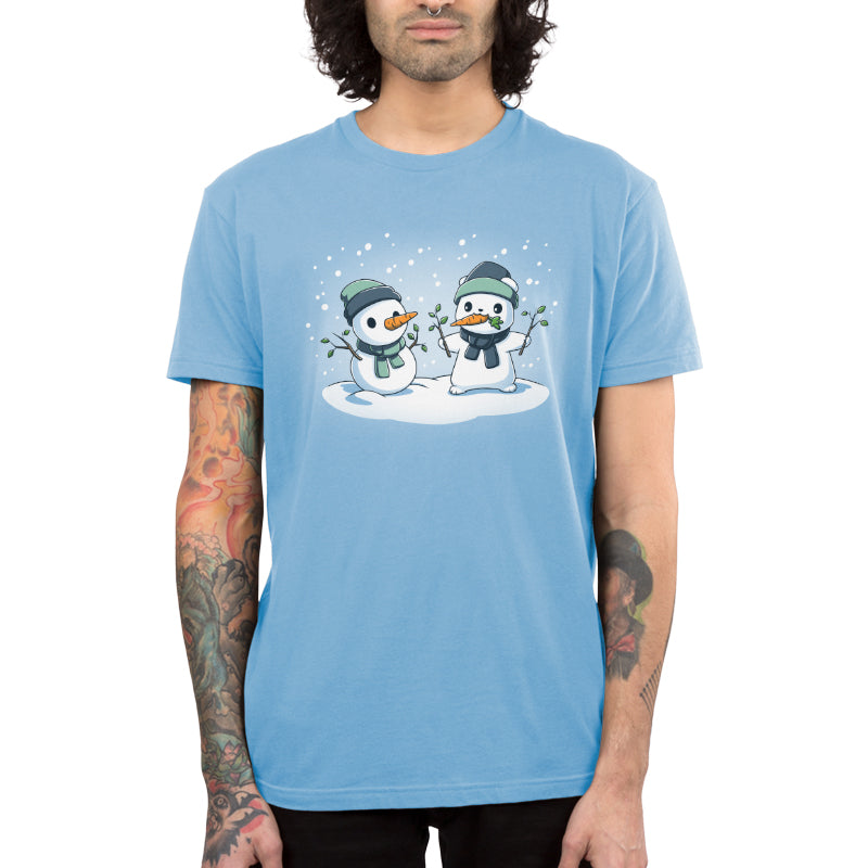 Premium Cotton T-shirt - featuring a polar bear in a green hat and scarf holding up two branches in its hands with a carrot in its mouth standing in front of a snowman doing the exact same thing