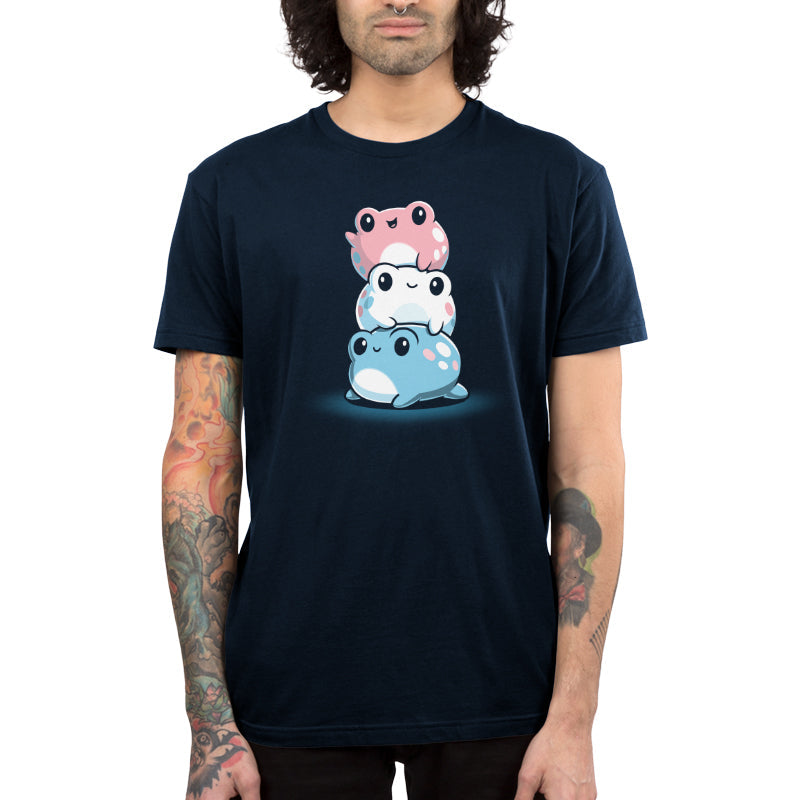 Premium Cotton T-shirt_TeeTurtle Trans Pride Frogs navy blue t-shirt featuring a pink frog waving on top, a white frog in the middle, and a light blue frog on the bottom all smiling and looking content.