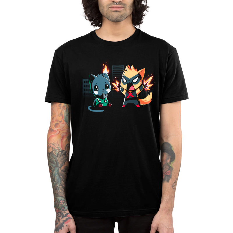 Premium Cotton T-shirt_TeeTurtle black Cat Fight featuring two cats in superhero costumes with one cat crying since its ear on fire, and the other cat powering up with a city in the background.