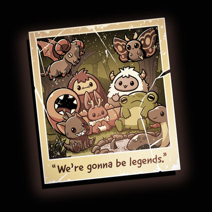 Premium Cotton T-shirt_TeeTurtle We're Gonna Be Legends black t-shirt featuring an illustration of a vintage polaroid photo showing a group picture with various mythical creatures in a woodland setting. "We're gonna be legends" is written underneath.